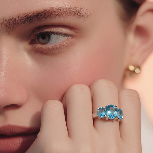 Pacifica 6.5 carat authentic Swiss Blue Topaz .925 Sterling Silver handmade Statement Ring size 6 3/4 - Close-up of Swiss Blue Topaz ring worn on hand, side view.