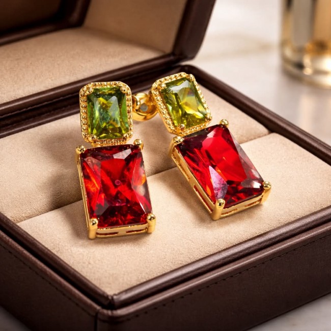 Art deco Magnificent Jewel 10.4 carat Red Topaz .925 Sterling Silver dipped in 18K Gold handcrafted incredible earrings - Art deco earrings with red and green gemstones in a display box.