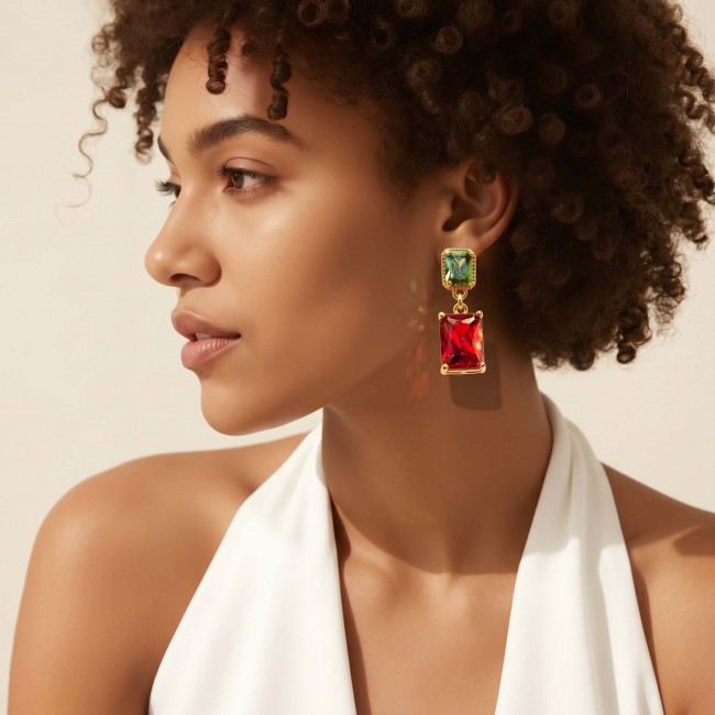 Art deco Magnificent Jewel 10.4 carat Red Topaz .925 Sterling Silver dipped in 18K Gold handcrafted incredible earrings - Side view of Art Deco earrings with red topaz and green accents.