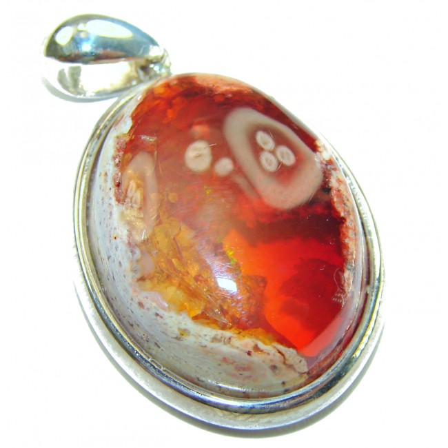 Inner Fire Natural 20.2 carat Mexican Fire Opal .925 Sterling Silver dipped in rhodium handmade Pendant - Close-up of Inner Fire Mexican Fire Opal in .925 sterling silver setting.