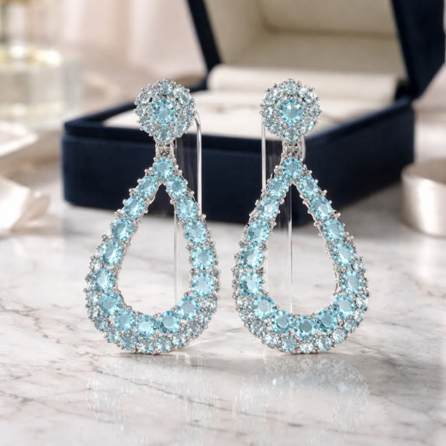 Serenity 18.5 carat genuine Swiss Blue Topaz .925 Sterling Silver handmade Large Statement earrings - Front view of Serenity earrings with Swiss Blue Topaz in box