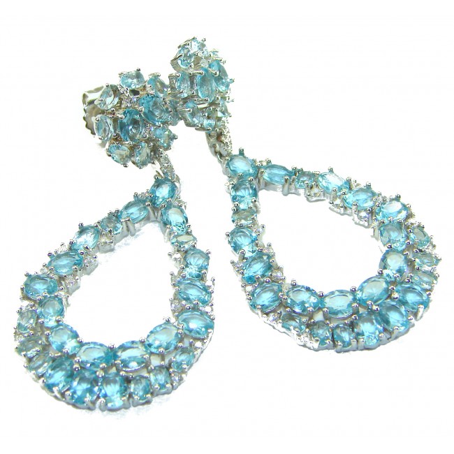 Serenity 18.5 carat genuine Swiss Blue Topaz .925 Sterling Silver handmade Large Statement earrings - Close-up of Swiss Blue Topaz teardrop earrings on white background.