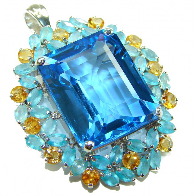 Majestic - Vintage style oval cut 46.8 carat Swiss Blue Topaz .925 Sterling Silver DIPPED IN RHODIUM handmade Pendant Brooch - Close-up of vintage-style pendant with large blue gemstone and smaller gems