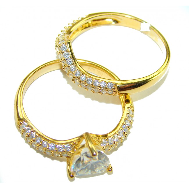 Sparkling pavé 4.5 carat Moissanite curve in a chic chevron shape Luxurios .925 Sterling silver Stackable Heart Ring size 7 - Gold rings with pavé stones and a moissanite, top view.