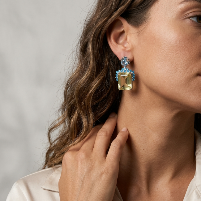 Giovanna - Authentic 12.9 carat Brazilian Citrine .925 Sterling Silver dipped in rhodium handcrafted earrings - Side view of citrine earrings worn, highlighting the gemstone.