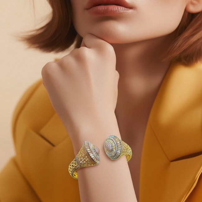 Art Deco Genuine 76.5 carat White Topaz .925 Sterling Silver handcrafted 2 tones Statement bracelet - White Topaz bracelet worn on wrist, close-up view with yellow outfit.