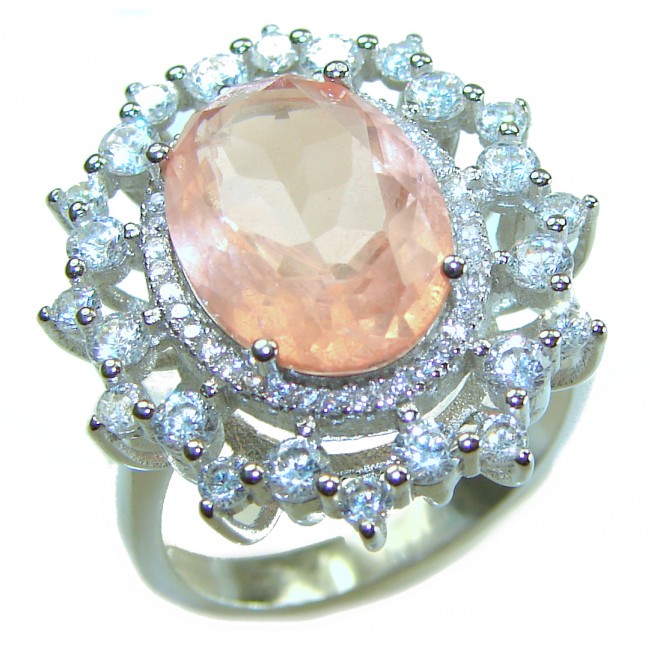 Authentic oval cut 9.2 carat Morganite 14K White Gold over .925 Sterling Silver ring s. 8 1/4 - Close-up of an oval cut Morganite ring with diamond halo detailing.