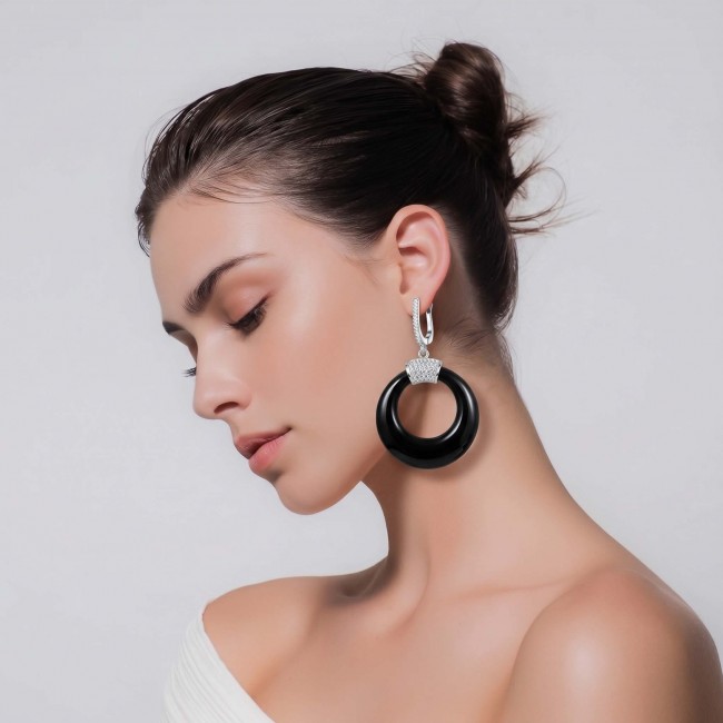 Outstanding authentic Onyx .925 Sterling Silver Earrings - Side view of Onyx .925 Sterling Silver Earrings on model.