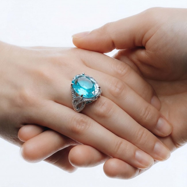 Gabriella 4.2 carat authentic Paraiba Tourmaline rhodium over .925 Sterling Silver handcrafted Statement Ring size 7 1/4 - Paraiba Tourmaline ring worn on hand, showing stone close-up.