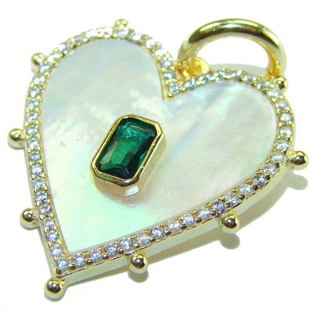 Precious Heart Blister Pearl 0.9 carat Emerald .925 Sterling Silver dipped in 18K Gold Pendant - Heart-shaped pendant with emerald center, top view.