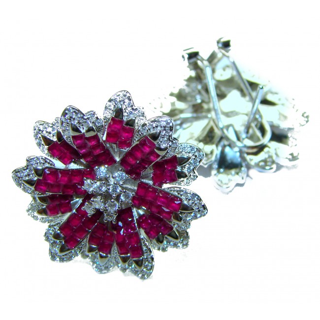 Bella Rosa Genuine 22.8 carat Ruby .925 Sterling Silver dipped in rhodium Statement brilliantly handcrafted earrings - Close-up of Bella Rosa 22.8 carat ruby earrings in sterling silver.