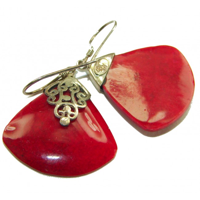 Elizabeth Natural Fossilized Coral .925 Sterling Silver handcrafted earrings - Red coral earrings close-up with intricate silver detailing.