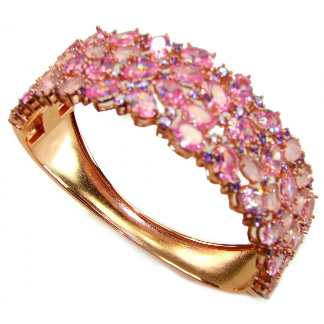 Luxurious 85.4 carat Pink Sapphire 22K real ROSE Gold over .925 Sterling Silver handcrafted Bracelet - Luxurious pink sapphire rose gold bangle, side view.