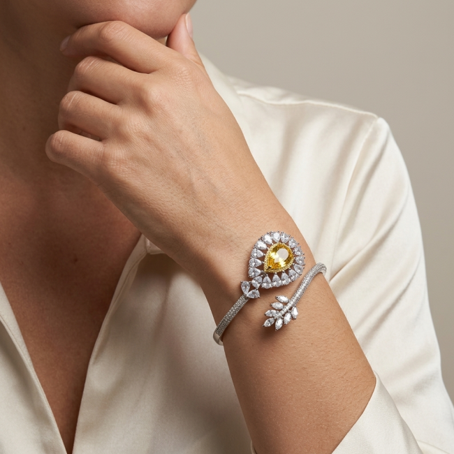 Dolce Vita - Precious Natural 18.5 carat yellow Sapphire .925 Sterling Silver handcrafted LARGE bracelet - Elegant bracelet with yellow sapphire worn on wrist, side view.