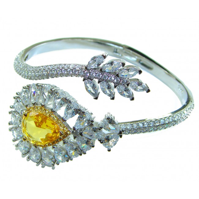 Dolce Vita - Precious Natural 18.5 carat yellow Sapphire .925 Sterling Silver handcrafted LARGE bracelet - Side view of diamond-encrusted bracelet with yellow sapphire centerpiece.