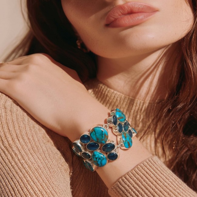 Luxurious one of a kind 65.8 carat Copper Turquoise .925 Sterling Silver handmade Bracelet - Woman wearing 65.8 ct copper turquoise bracelet, close-up view.