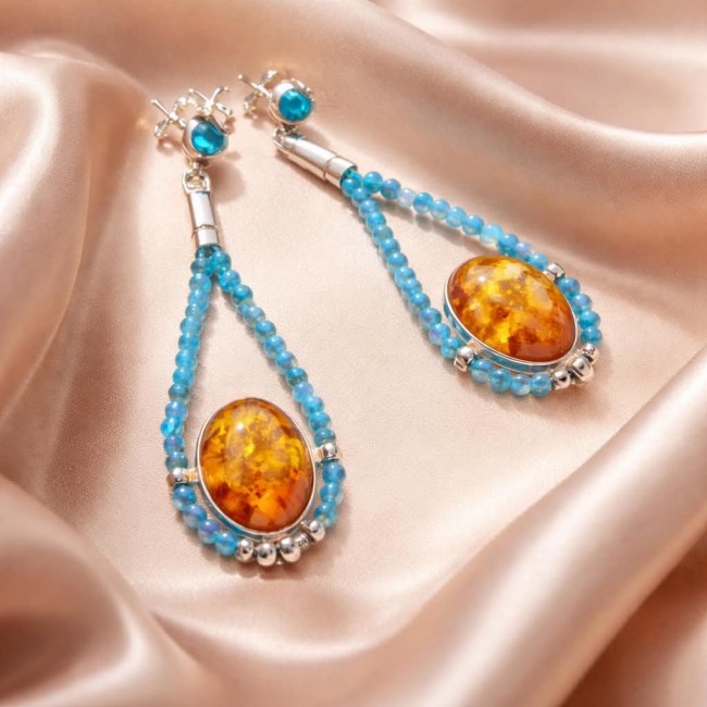 Seaside Natural Baltic Amber Aquamarine .925 Sterling Silver handmade earrings - Amber aquamarine earrings on silk, front view.