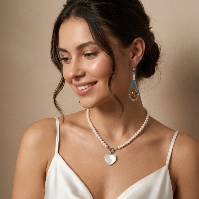 Seaside Natural Baltic Amber Aquamarine .925 Sterling Silver handmade earrings - Woman wearing Seaside Amber Aquamarine Silver jewelry, side view.