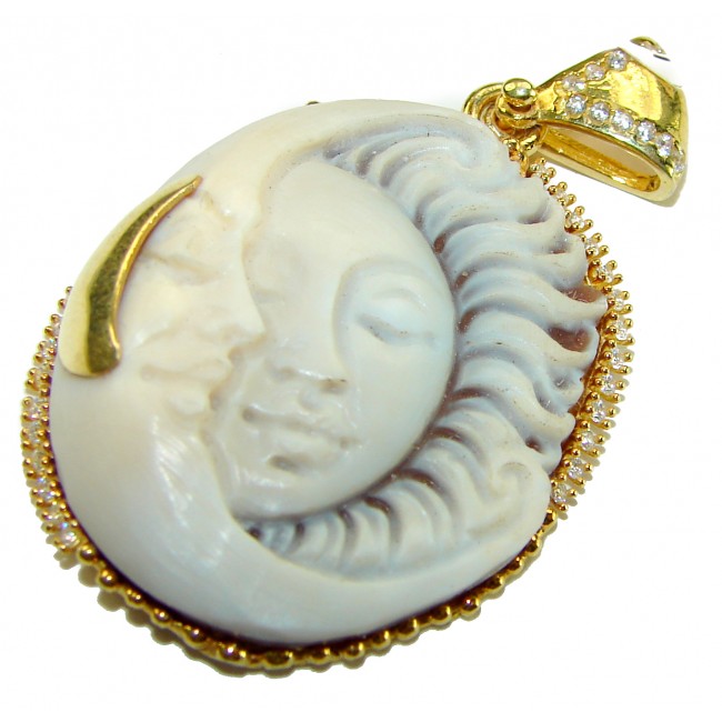 Perfect Balance Exquisite Cameo from Sea Shell 22K Gold over .925 Sterling SilverMade in Italy Statement pendant - Cameo pendant with sun and moon design, gold detail, overhead view.