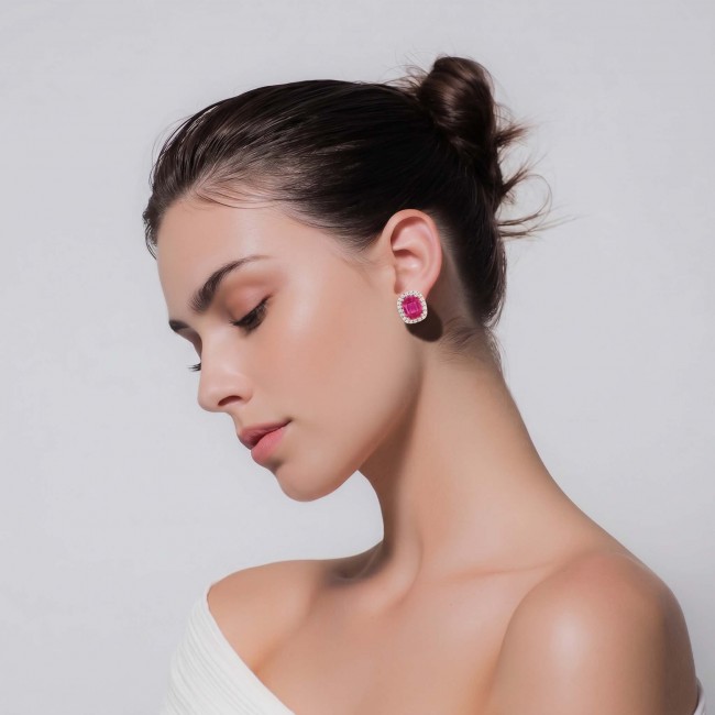 Black Lable Collection - Authentic 4.8 carat Mozambique Ruby 22K Rose Gold over .925 Sterling Silver brilliantly handcrafted earrings - Woman in profile wearing Black Label 4.8 carat Mozambique stud earring