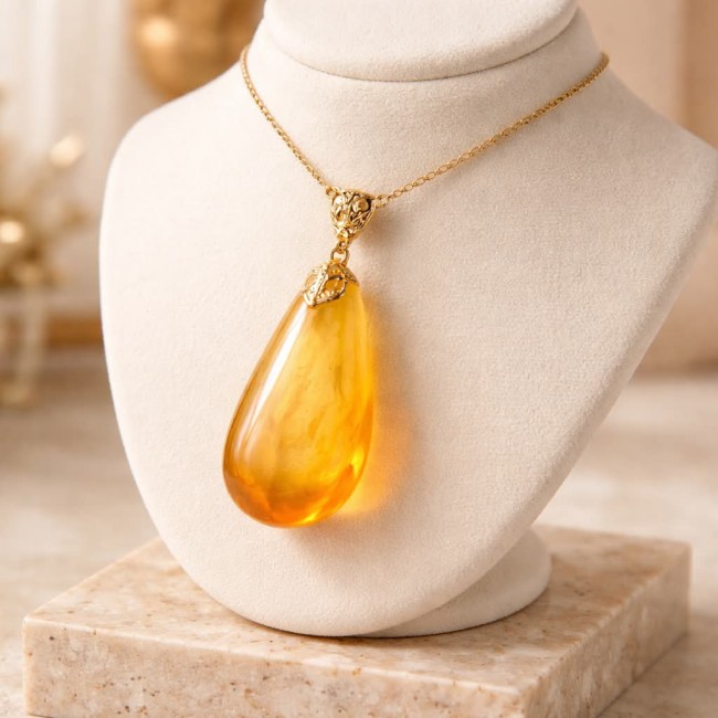 Prehistoric Authentic Baltic Amber REAL 14k Gold beautifully handcrafted Pendant - Amber pendant necklace on display bust, front view.