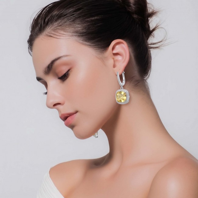 Vivien Luxurious Style - Natural 8.2 carat Citrine .925 Sterling Silver dipped in Rhodium handmade earrings - Side view of woman wearing Vivien Luxurious Style Citrine earrings.