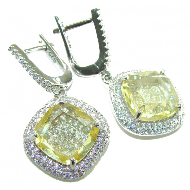 Vivien Luxurious Style - Natural 8.2 carat Citrine .925 Sterling Silver dipped in Rhodium handmade earrings - Close-up of citrine earrings with diamond accents, showcasing clasp detail.