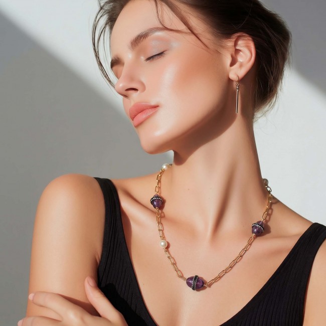 Natural Amethyst 14K Gold over .925 Sterling Silver handcrafted necklace, 32 inches - Woman wearing Amethyst 14K Gold necklace, side view, light background.
