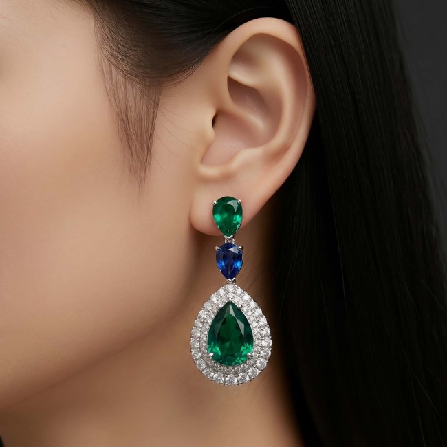 Tiffany - Authentic 10.5 CARAT Chrome Diopside Sapphire .925 Sterling Silver handcrafted earrings - Emerald sapphire drop earrings worn on ear, side view.
