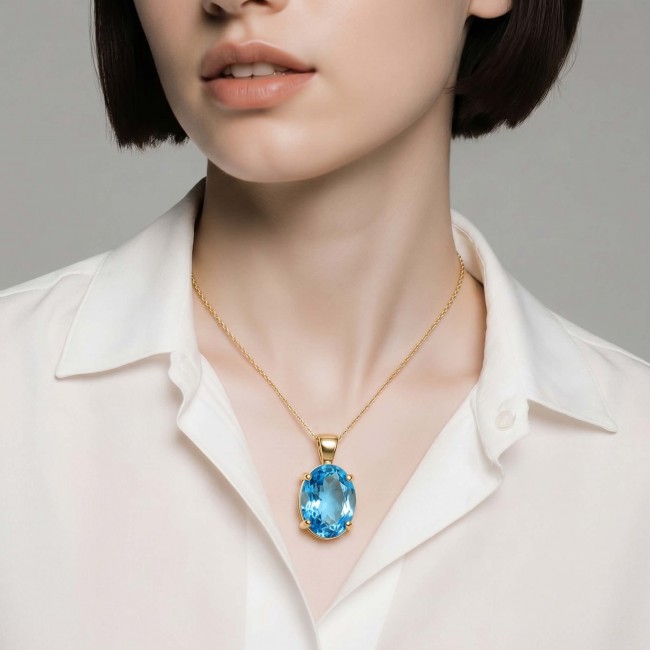 Vintage style 9.8 carat Swiss Blue Topaz .925 Sterling Silver DIPPED IN 18K Gold handmade Pendant - Necklace with Swiss Blue Topaz pendant worn on model.