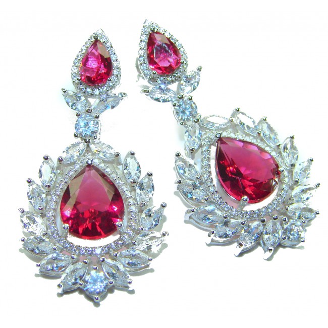 Tiffany - authentic 7.5 carat Ruby .925 Sterling Silver dipped in rhodium handcrafted Statement Earrings - Elegant earrings with ruby and diamond stones, front view.