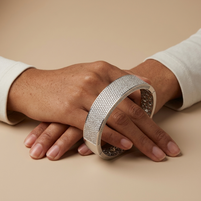 Tiffany Genuine 28.5 carat White Topaz rhodium over .925 Sterling Silver handcrafted Statement bracelet - Close-up of a Tiffany white topaz bracelet worn on a person's hand.