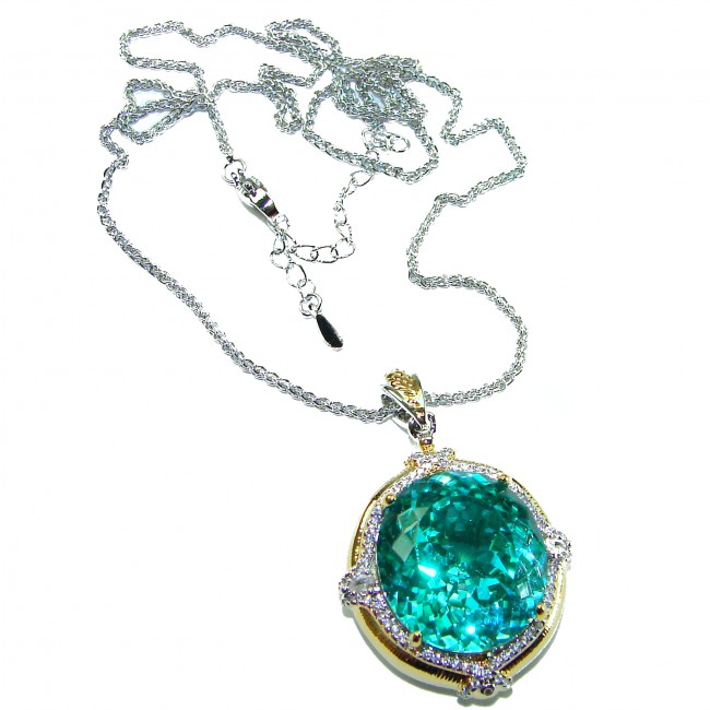 Wonderland 24.3 carat fancy oval cut Paraiba Tourmaline 2 tones .925 Sterling Silver Handcrafted Statement necklace - Paraiba Tourmaline necklace stone close-up with chain detail.