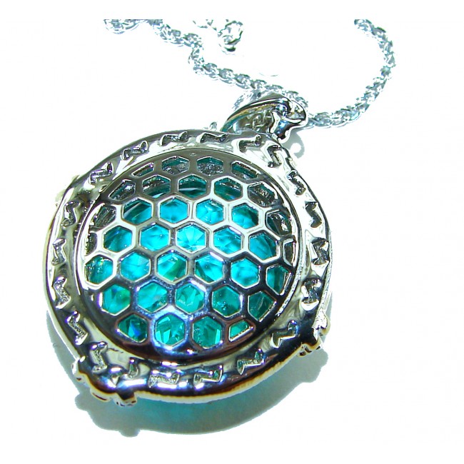 Wonderland 24.3 carat fancy oval cut Paraiba Tourmaline 2 tones .925 Sterling Silver Handcrafted Statement necklace - Close-up of a 24.3 carat oval Paraiba Tourmaline pendant with hexagon design.