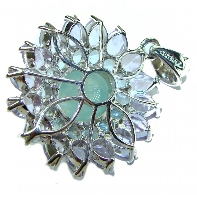 Royal quality genuine 19.8 carat Prehnite rhodium over .925 Sterling Silver handcrafted Pendant - Close-up of a prehnite pendant with rhodium detailing.