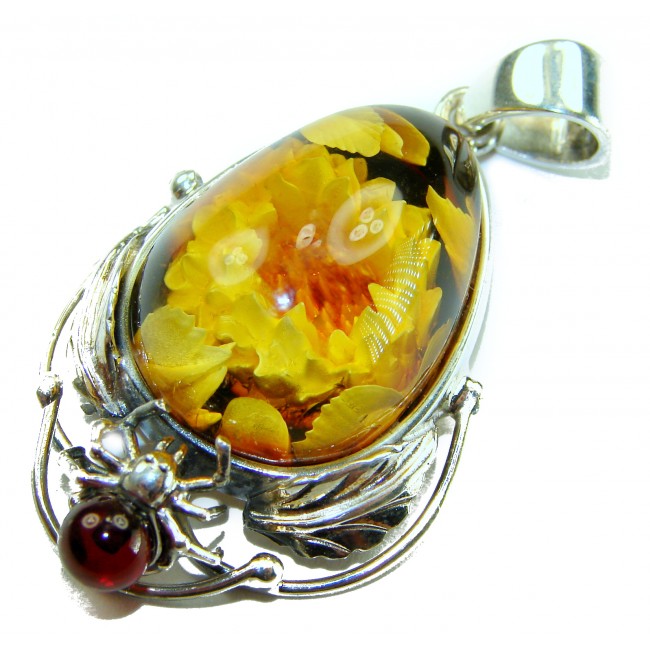 REAL ART! SUMMER Wild Sunflowers Fabulous - carved GENUINE Baltic Amber Sterling Silver handmade Pendant - Amber sunflower pendant with silver spider detail, close-up view.