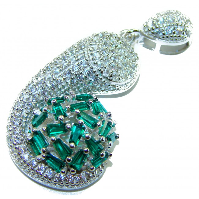 Amazonia - 15.8 carat Colombian Emerald .925 Sterling Silver handmade Statement pendant - Close-up of Amazonia pendant with emeralds and silver detailing.
