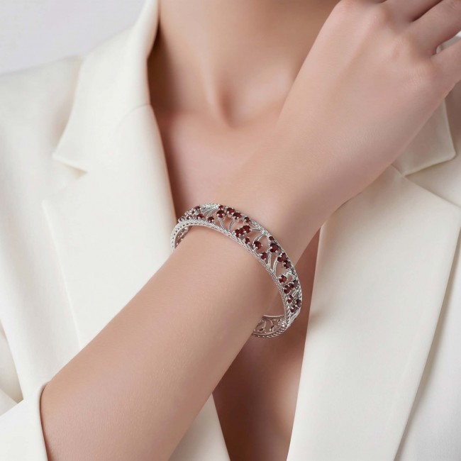 Authentic 18.2 carat Garnet .925 Sterling Silver handmade bangle Bracelet - Worn on hand, Garnet and Sterling Silver bracelet close-up.