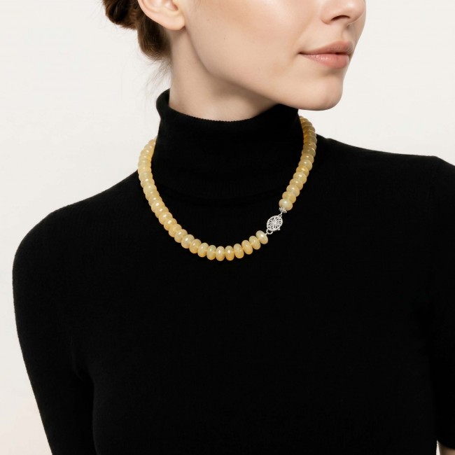 Victoria Authentic 228.5 carat Brazilian Citrine .925 Sterling Silver brilliantly handcrafted Statement necklace - Side view of Victoria Authentic Citrine necklace worn on a model.