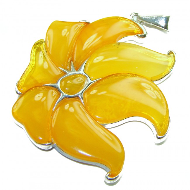 Golden Wild Lotus Natural Butterscotch Baltic Polish Amber .925 Sterling Silver dipped in rhodium handcrafted Pendant - Golden Lotus Pendant close-up with Butterscotch Baltic Amber