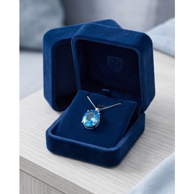 Vintage style 20.8 carat Swiss Blue Topaz .925 Sterling Silver DIPPED IN RHODIUM handmade Pendant - Blue topaz pendant in box, top view, showcasing the gemstone.