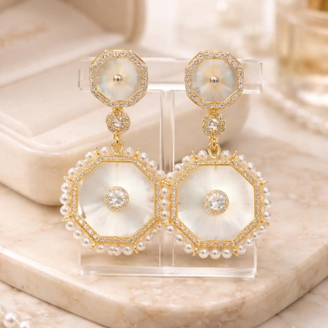 Large - Sublime Blister Pearl White Sapphire 18K Gold over .925 Sterling Silver handcrafted Earrings - Front view of octagonal pearl and sapphire drop earrings on stand.