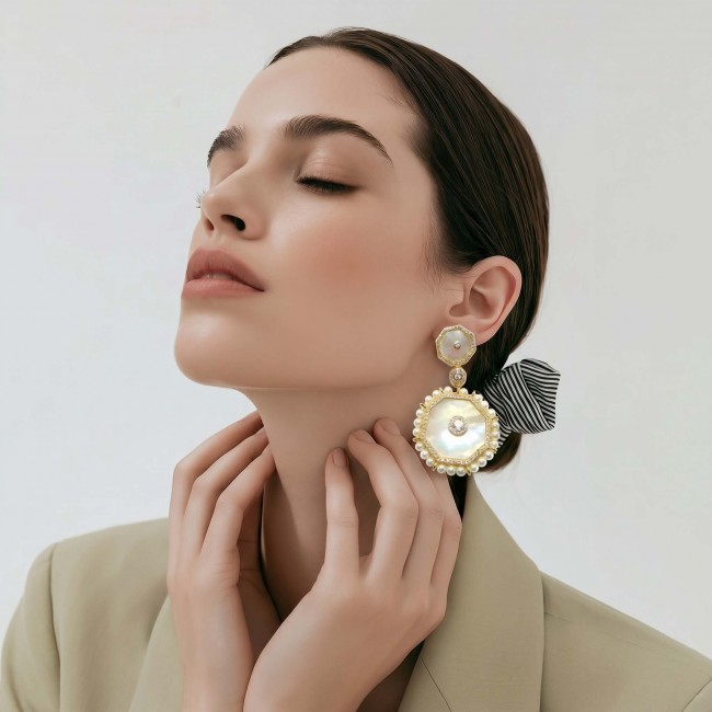 Large - Sublime Blister Pearl White Sapphire 18K Gold over .925 Sterling Silver handcrafted Earrings - Woman wearing large blister pearl earrings, side profile view.