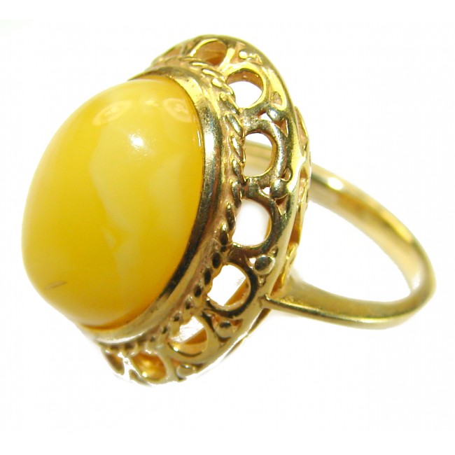 Authentic Butterscotch Baltic Amber 18K Gold over .925 Sterling Silver handcrafted ring; s. 7 adjustable - Side view of a butterscotch Baltic amber ring in 18K gold over .925 silver.