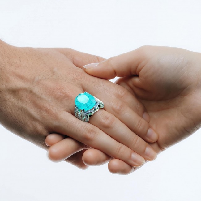Ocean 14.5 carat Paraiba Tourmaline .925 Sterling Silver Handcrafted Ring size 8 1/4 - Ocean Paraiba Tourmaline ring worn on hand, highlighting stone and band.