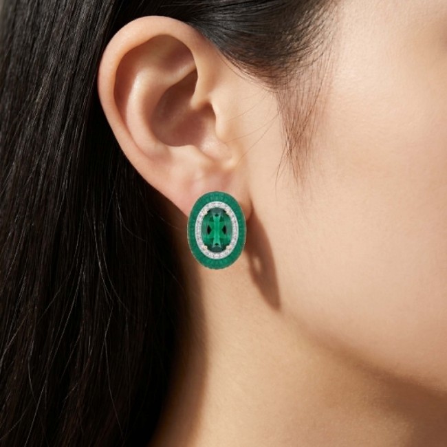 Julietta 12.5 carat Colombian Emerald .925 Sterling Silver handmade Statement earrings - Side view of Julietta emerald earring worn on ear.