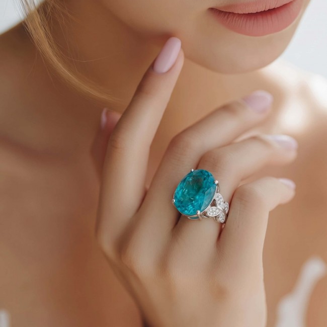 Eau Pure 10.5 carat Paraiba Tourmaline .925 Sterling Silver Handcrafted Ring size 8 - Close-up of Paraiba Tourmaline ring worn on a hand.