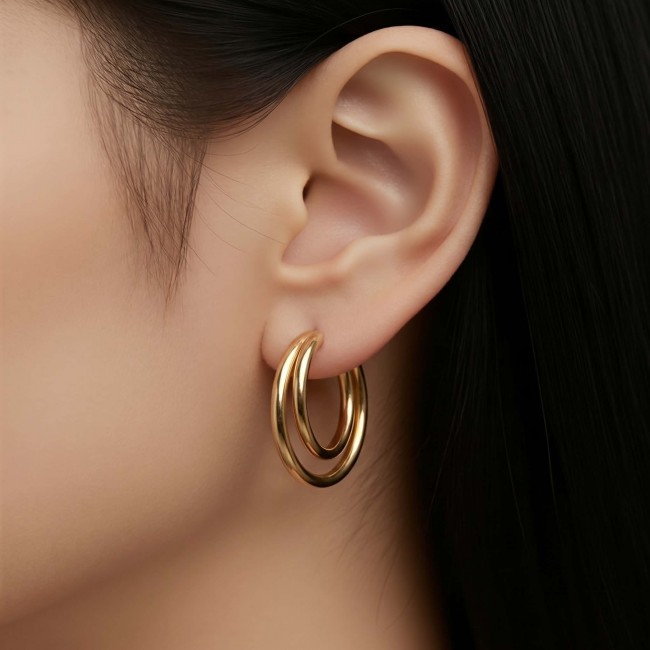 Dubai Style - Golden fantasy .925 Sterling Silver dipped in 22K Gold handmade Earrings - Side view of golden hoop earrings worn on ear.