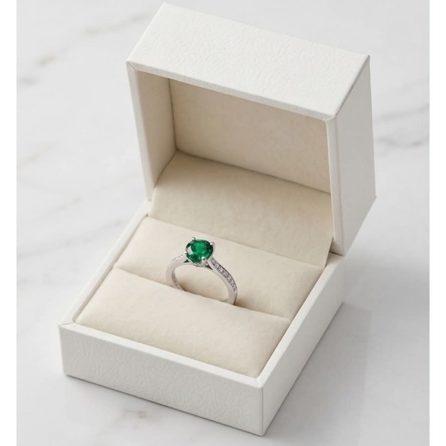 Authentic 1.5 carat Colombian Emerald .925 Sterling Silver handcrafted two sided Ring size 6 - Emerald ring in open box, front view on white background.