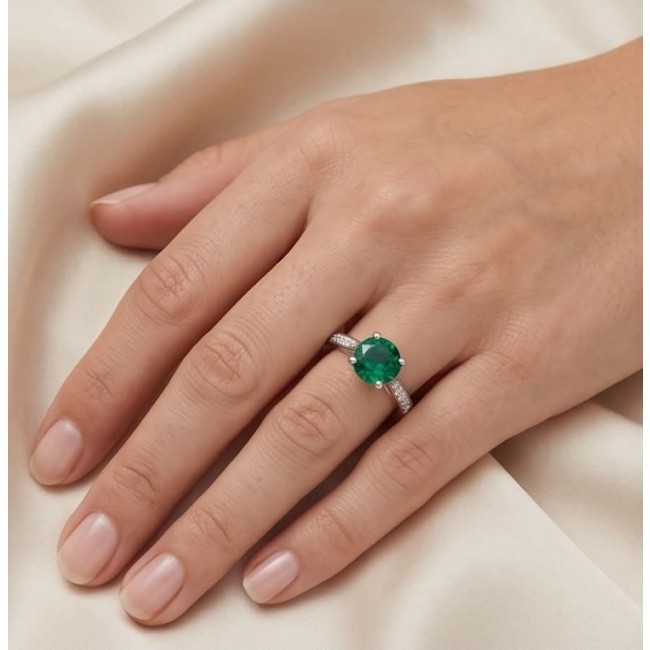 Authentic 1.5 carat Colombian Emerald .925 Sterling Silver handcrafted two sided Ring size 6 - Emerald ring worn on hand, showcasing green stone and silver band.